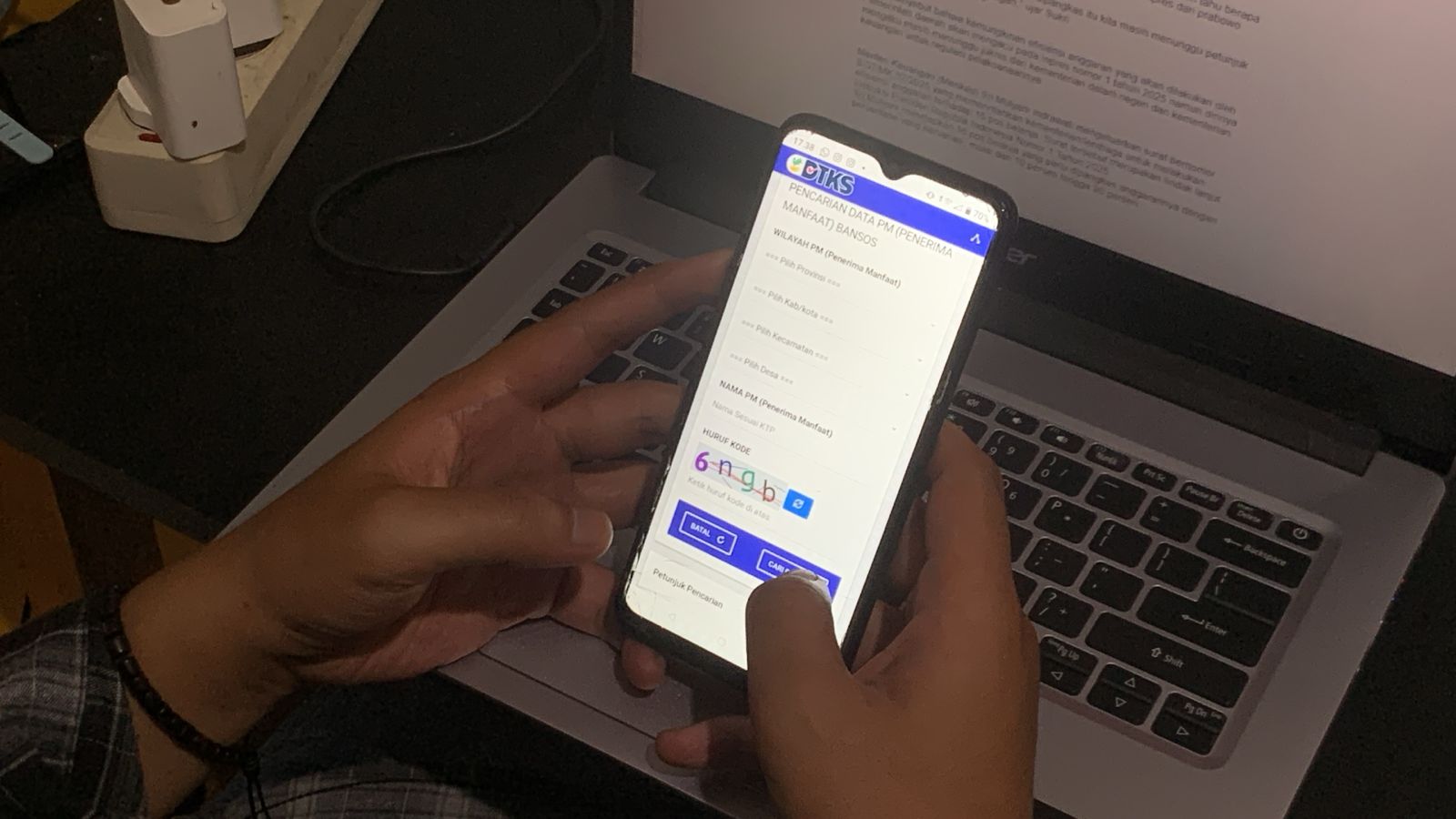 Keterangan foto : Cek Status Bantuan Sosial 2025.(sumber : Komparasi.id)